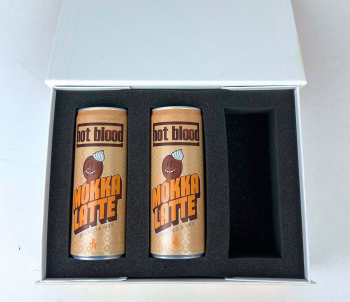 Two mocha latte cans in a black foam gift box