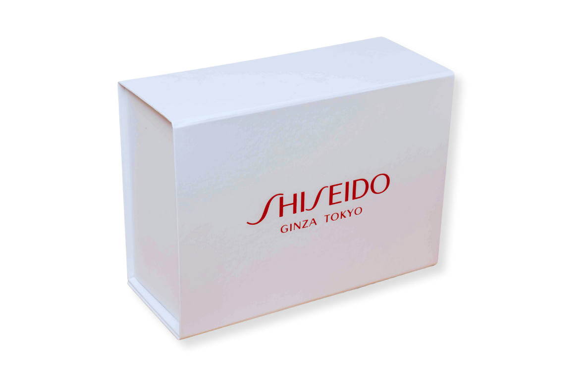White magnetic box with red print 'Shiseido Ginza Tokyo'