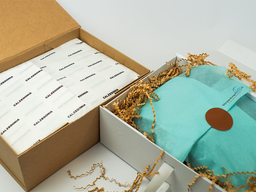 Gift box with tissue paper and corrugated packaging for a stylish presentation